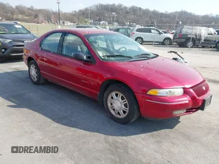 1998 Chrysler Cirrus LXi z VIN 1C3EJ56H1WN261697, wystawiony jako IAAI lot #41788970 z przebiegiem 174 879 mil mil oraz . Historia ofert i sprzedaży dostępna na DreamBid. Obrazek 1.