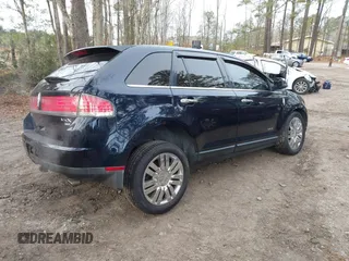 2009 Lincoln MKX with VIN 2LMDU88C99BJ07207, listed as a IAAI auction lot 41300392 with 218,185 mi miles. Bid and sale history available at carsss.com. Image 4.