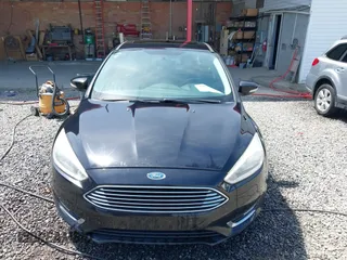 2016 Ford Focus Titanium z VIN 1FADP3J28GL393422, wystawiony jako IAAI lot #42075513 z przebiegiem 146 535 mil mil oraz . Historia ofert i sprzedaży dostępna na DreamBid. Obrazek 12.