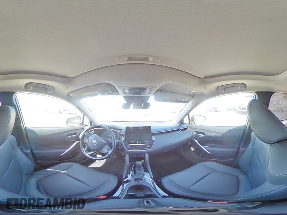 2023 Toyota Corolla Cross XLE with VIN 7MUDAAAG0PV063242, listed as a Copart auction lot 52511585 with 10,695 mi miles and Salvage title. Bid and sale history available at DreamBid. Image 14.