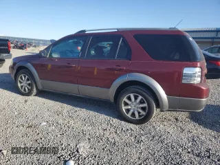 2008 Ford Taurus X SEL with VIN 1FMDK02W68GA27117, listed as a Copart auction lot 52310685 with 178,529 mi miles and Salvage Title. Bid and sale history available at DreamBid. Image 2.