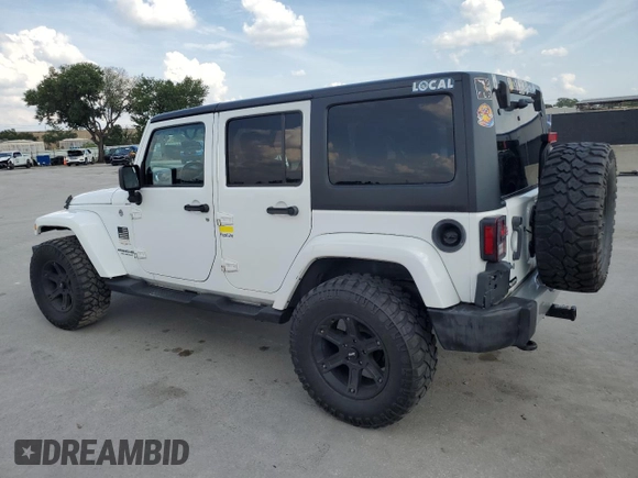 2013 Jeep Wrangler Unlimited Sahara with VIN 1C4BJWEG4DL536694, listed as a Copart auction lot 57714035 with 146,257 mi miles and Salvage title. Bid and sale history available at DreamBid. Image 2.