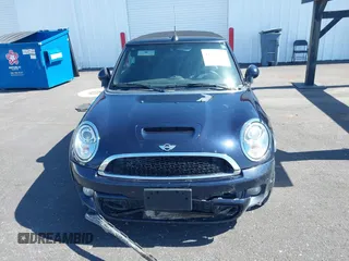 2014 MINI Convertible S z VIN WMWZP3C53ET706796, wystawiony jako IAAI lot #42363811 z przebiegiem 93 581 mil mil oraz . Historia ofert i sprzedaży dostępna na DreamBid. Obrazek 12.