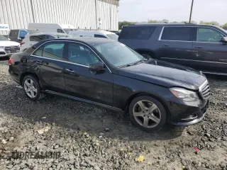 2014 Mercedes-Benz E 350 Luxury with VIN WDDHF8JB4EB032659, listed as a Copart auction lot 54507025 with 85,537 mi miles and Salvage Title. Bid and sale history available at DreamBid. Image 4.