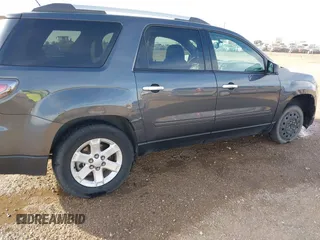 2014 GMC Acadia SLE with VIN 1GKKRNED4EJ323433, listed as a IAAI auction lot 41419175 with 165,015 mi miles and . Bid and sale history available at carsss.com. Image 6.
