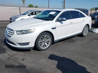 2013 Ford Taurus Limited z VIN 1FAHP2F81DG234724, wystawiony jako IAAI lot #42574509 z przebiegiem 189 997 mil mil oraz . Historia ofert i sprzedaży dostępna na DreamBid. Obrazek 2.