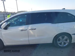 2019 Honda Odyssey EX-L z VIN 5FNRL6H76KB083005, wystawiony jako IAAI lot #41589181 z przebiegiem 27 633 mil mil oraz . Historia ofert i sprzedaży dostępna na DreamBid. Obrazek 14.