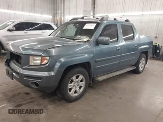 2006 Honda Ridgeline RTL with VIN 2HJYK16556H508101, listed as a IAAI auction lot 41909651 with 301,945 mi miles. Bid and sale history available at carsss.com. Image 2.