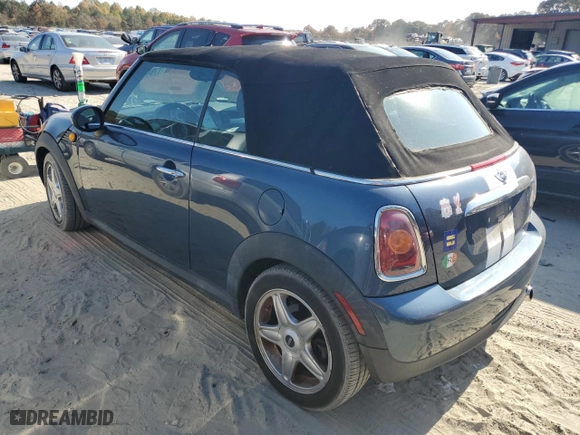 2009 MINI Cooper Convertible with VIN WMWMR33559TU96728, listed as a Copart auction lot 77949004 with 86,084 mi miles and Clean Title. Bid and sale history available at carsss.com. Image 2.