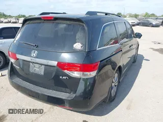 2015 Honda Odyssey EX-L with VIN 5FNRL5H68FB094983, listed as a IAAI auction lot 42031539 with 231,144 mi miles and . Bid and sale history available at DreamBid. Image 4.