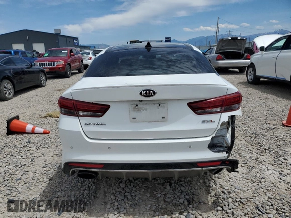 2017 Kia Optima SX Limited z VIN 5XXGV4L28HG173327, wystawiony jako Copart lot #61755435 z przebiegiem 97 064 mil mil oraz Szkoda całkowita • Salvage title. Historia ofert i sprzedaży dostępna na DreamBid. Obrazek 6.