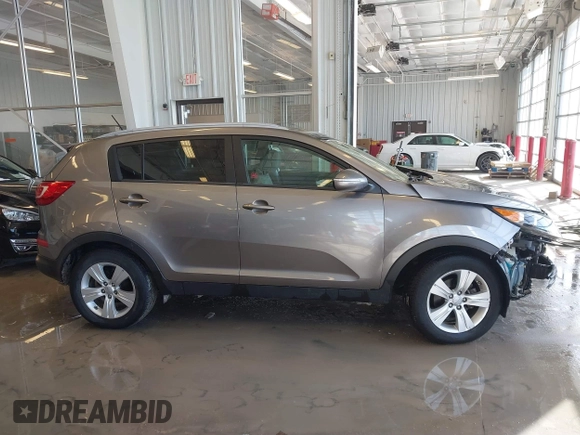 2012 Kia Sportage LX with VIN KNDPB3A23C7317650, listed as a IAAI auction lot 41631193 with 96,433 mi miles. Bid and sale history available at carsss.com. Image 14.