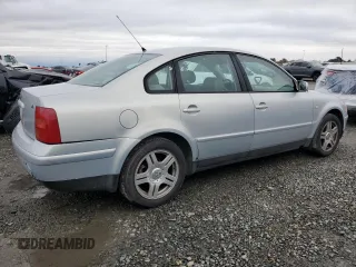 2000 Volkswagen Passat z VIN WVWPD23B0YP431209, wystawiony jako Copart lot #84954554 z przebiegiem 149 382 mil mil oraz Szkoda całkowita • Salvage title. Historia ofert i sprzedaży dostępna na DreamBid. Obrazek 3.