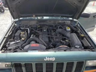 1999 Jeep Cherokee Sport with VIN 1J4FF68S2XL570795, listed as a Copart auction lot 61860585 with 320,467 mi miles and Salvage title. Bid and sale history available at DreamBid. Image 12.