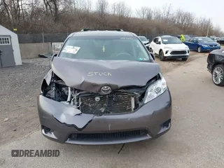 2014 Toyota Sienna LE with VIN 5TDJK3DC1ES087626, listed as a IAAI auction lot 41610813 with 142,311 mi miles and . Bid and sale history available at DreamBid. Image 12.