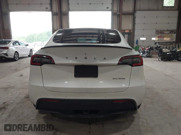 2020 Tesla Model Y Long Range z VIN 5YJYGDEE5LF041935, wystawiony jako IAAI lot #42369750 z przebiegiem 79 540 mil mil oraz . Historia ofert i sprzedaży dostępna na DreamBid. Obrazek 17.