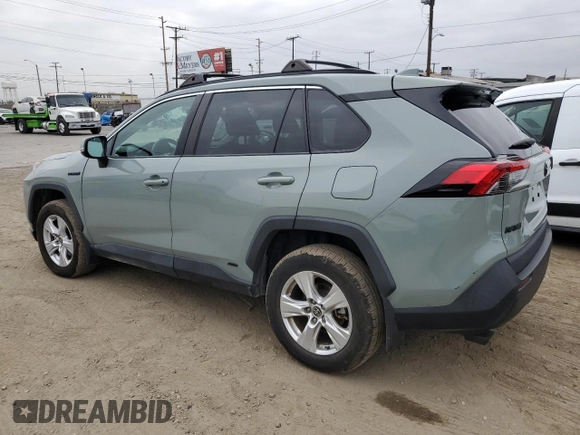 2021 Toyota RAV4 Hybrid XLE with VIN 2T3RWRFV8MW116853, listed as a Copart auction lot 65974935 with 89,319 mi miles and Salvage title. Bid and sale history available at DreamBid. Image 2.