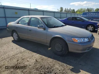 2000 Toyota Camry CE z VIN 4T1BG22K0YU692937, wystawiony jako Copart lot #57456985 z przebiegiem 116 617 mil mil oraz Szkoda całkowita • Salvage title. Historia ofert i sprzedaży dostępna na DreamBid. Obrazek 4.