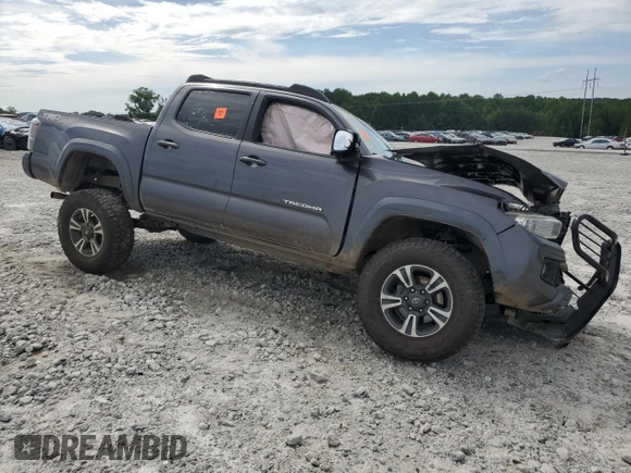 2017 Toyota Tacoma SR5 with VIN 5TFCZ5AN6HX083463, listed as a Copart auction lot 61348895 with 102,927 mi miles and Salvage title. Bid and sale history available at DreamBid. Image 4.
