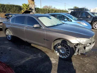 2014 BMW 7 Series 740Li with VIN WBAYE4C57ED137758, listed as a Copart auction lot 42347085 with 121,776 mi miles and Salvage Title. Bid and sale history available at carsss.com. Image 4.