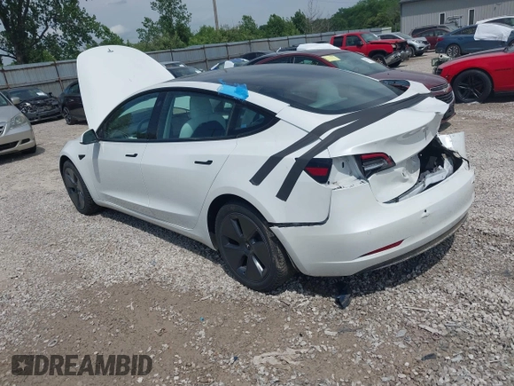 2022 Tesla Model 3 Long Range z VIN 5YJ3E1EB4NF165427, wystawiony jako IAAI lot #42290413 z przebiegiem 73 493 mil mil oraz . Historia ofert i sprzedaży dostępna na DreamBid. Obrazek 3.