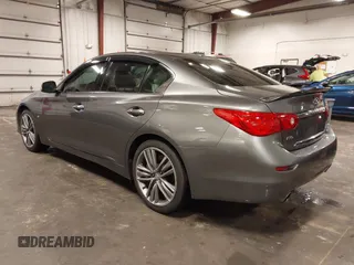 2014 Infiniti Q50 Premium with VIN JN1BV7ARXEM699902, listed as a IAAI auction lot 42135410 with 103,929 mi miles and . Bid and sale history available at DreamBid. Image 3.