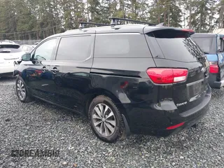 2016 Kia Sedona EX with VIN KNDMC5C11G6160910, listed as a IAAI auction lot 40905404 with 105,523 mi miles. Bid and sale history available at carsss.com. Image 3.