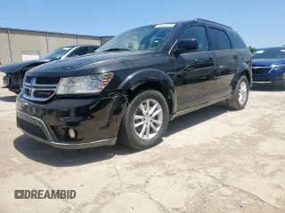 2013 Dodge Journey SXT with VIN 3C4PDCBGXDT557800, listed as a Copart auction lot 64415275 with 179,157 mi miles and Clean title. Bid and sale history available at DreamBid. Image 1.