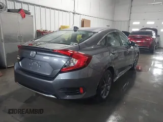 2020 Honda Civic EX-L with VIN 19XFC1F70LE010163, listed as a IAAI auction lot 41306532 with 88,767 mi miles and . Bid and sale history available at DreamBid. Image 4.