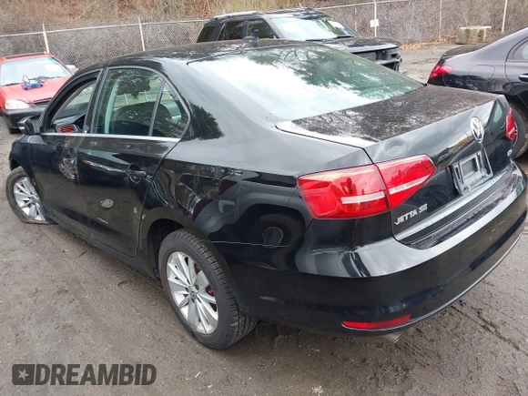 2015 Volkswagen Jetta Sedan 1.8T SE with VIN 3VWD17AJ3FM225093, listed as a IAAI auction lot 41974219 with 69,061 mi miles. Bid and sale history available at carsss.com. Image 3.