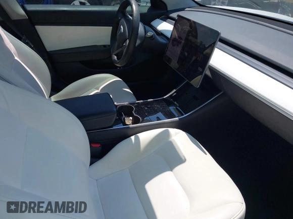 2019 Tesla Model 3 Long Range with VIN 5YJ3E1EB4KF494432, listed as a IAAI auction lot 42009327 with 121,954 mi miles and . Bid and sale history available at DreamBid. Image 5.