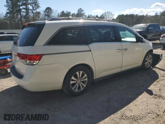 2016 Honda Odyssey EX-L with VIN 5FNRL5H69GB003379, listed as a Copart auction lot 48932295 with 144,904 mi miles and Salvage Title. Bid and sale history available at DreamBid. Image 3.