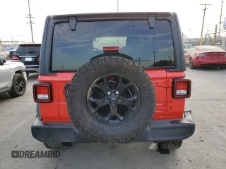 2022 Jeep Wrangler Unlimited High Tide with VIN 1C4HJXDG5NW107100, listed as a Copart auction lot 83231044 with 37,898 mi miles and Salvage Title. Bid and sale history available at DreamBid. Image 6.