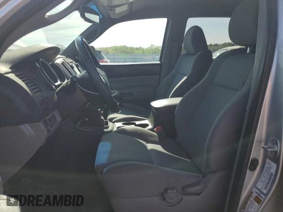 2013 Toyota Tacoma with VIN 5TFLU4EN7DX073036, listed as a Copart auction lot 52871485 with 114,809 mi miles and Salvage Title. Bid and sale history available at DreamBid. Image 7.