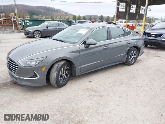 2022 Hyundai Sonata Hybrid Blue with VIN KMHL24JJ2NA048439, listed as a IAAI auction lot 40942477 with 64,855 mi miles. Bid and sale history available at carsss.com. Image 2.