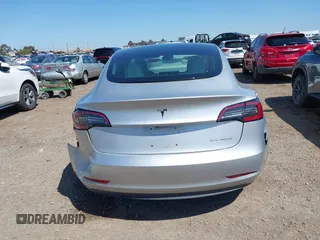 2018 Tesla Model 3 Long Range Battery with VIN 5YJ3E1EB5JF100578, listed as a IAAI auction lot 41959766 with 57,931 mi miles and . Bid and sale history available at DreamBid. Image 16.