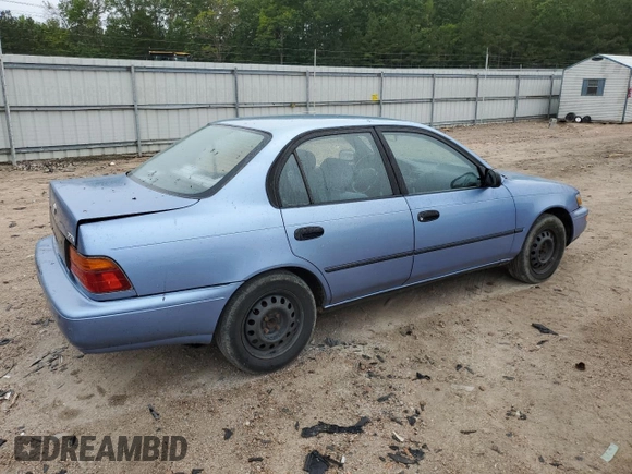 1995 Toyota Corolla DX with VIN 2T1AE09B5SC127586, listed as a Copart auction lot 57075045 with 244,969 mi miles and Salvage title. Bid and sale history available at DreamBid. Image 3.