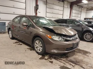 2012 Honda Civic LX z VIN 2HGFB2F52CH500522, wystawiony jako IAAI lot #41237243 z przebiegiem 145 372 mil mil oraz . Historia ofert i sprzedaży dostępna na DreamBid. Obrazek 1.
