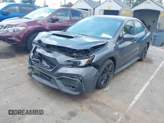 2023 Subaru WRX Premium z VIN JF1VBAF61P9802179, wystawiony jako IAAI lot #42824452 z przebiegiem 9 719 mil mil oraz . Historia ofert i sprzedaży dostępna na DreamBid. Obrazek 2.