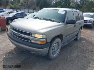 2003 Chevrolet Tahoe LS with VIN 1GNEC13V03R272663, listed as a IAAI auction lot 41933407 with 245,113 mi miles. Bid and sale history available at carsss.com. Image 2.