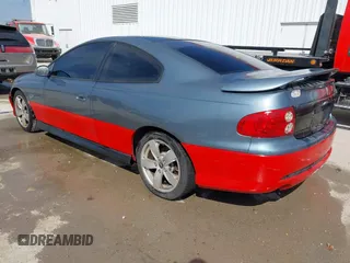 2005 Pontiac GTO with VIN 6G2VX12UX5L407635, listed as a IAAI auction lot 41768211 with 82,365 mi miles. Bid and sale history available at carsss.com. Image 3.