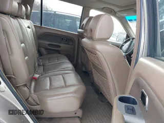 2006 Honda Pilot EX-L with VIN 2HKYF18526H546575, listed as a IAAI auction lot 41414263 with 118,872 mi miles and . Bid and sale history available at DreamBid. Image 8.