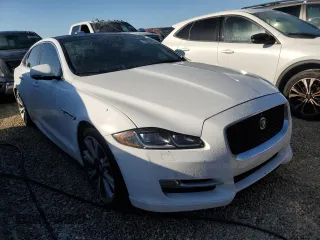 2019 Jaguar XJ with VIN SAJWJ1CD6K8W20725, listed as a Copart auction lot 76631854 with 25,261 mi miles and Salvage Title. Bid and sale history available at carsss.com. Image 4.