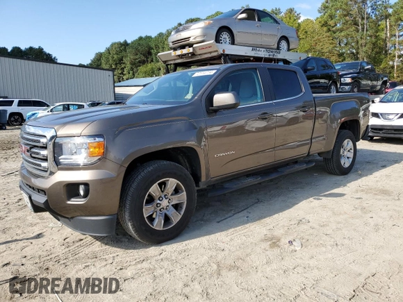 2016 GMC Canyon 4WD SLE with VIN 1GTG6CE38G1293670, listed as a Copart auction lot 72114774 with 125,659 mi miles and Salvage Title. Bid and sale history available at carsss.com. Image 1.
