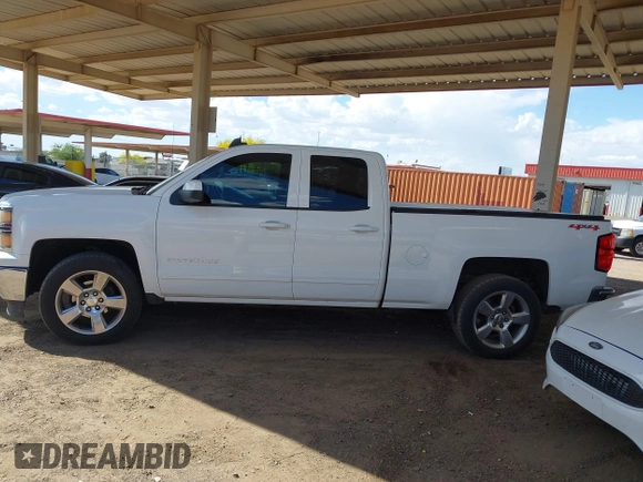 2015 Chevrolet Silverado 1500 LT with VIN 1GCVKREC1FZ415386, listed as a IAAI auction lot 42142990 with 165,409 mi miles and . Bid and sale history available at DreamBid. Image 14.