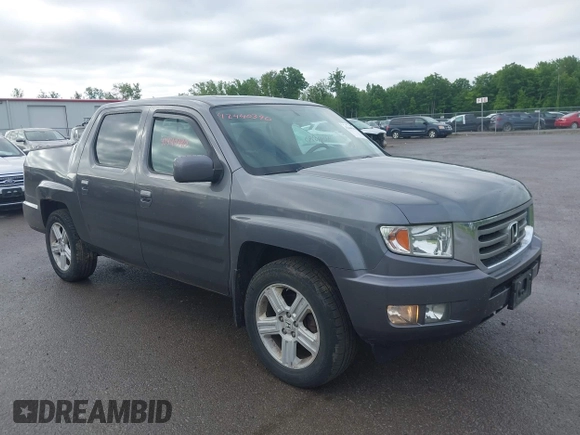 2014 Honda Ridgeline RTL with VIN 5FPYK1F5XEB011772, listed as a IAAI auction lot 42440390 with 145,219 mi miles and . Bid and sale history available at DreamBid. Image 1.