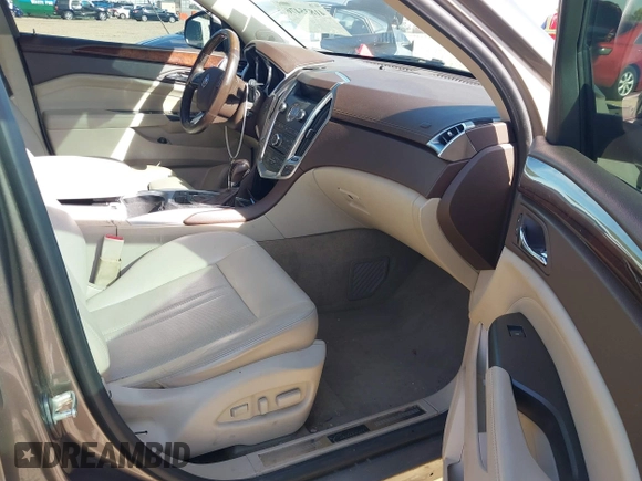 2012 Cadillac SRX Performance Collection with VIN 3GYFNBE3XCS565616, listed as a IAAI auction lot 41835476 with 141,259 mi miles. Bid and sale history available at carsss.com. Image 5.