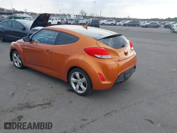 2013 Hyundai Veloster w/Black Int с VIN KMHTC6AD0DU122635, выставлен на аукционе IAAI как лот 41768900 с пробегом 110 358 миль миль и . История ставок и продаж доступна на DreamBid. Изображение 3.
