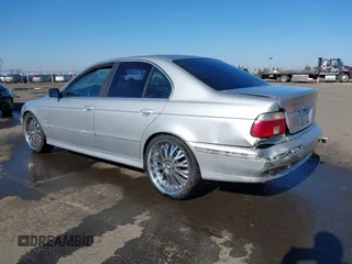 2003 BMW 5 Series 525i with VIN WBADT33473GF43821, listed as a IAAI auction lot 41450822 with 165,062 mi miles. Bid and sale history available at carsss.com. Image 3.