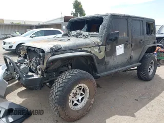 2016 Jeep Wrangler Unlimited Sahara z VIN 1C4HJWEG4GL261147, wystawiony jako IAAI lot #42239252 z przebiegiem 69 604 mil mil oraz . Historia ofert i sprzedaży dostępna na DreamBid. Obrazek 17.